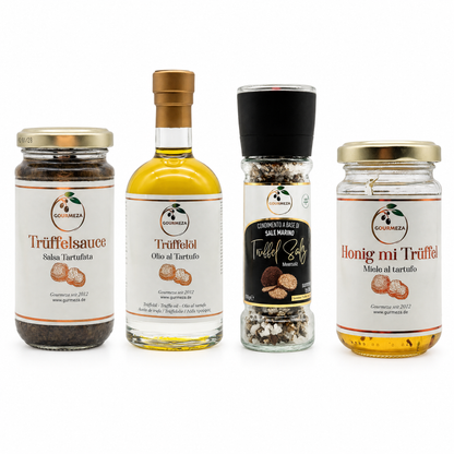 Trüffel-Probierset von Gourmeza: Trüffelsauce, Trüffelöl, Trüffelsalz und Trüffelhonig nebeneinander